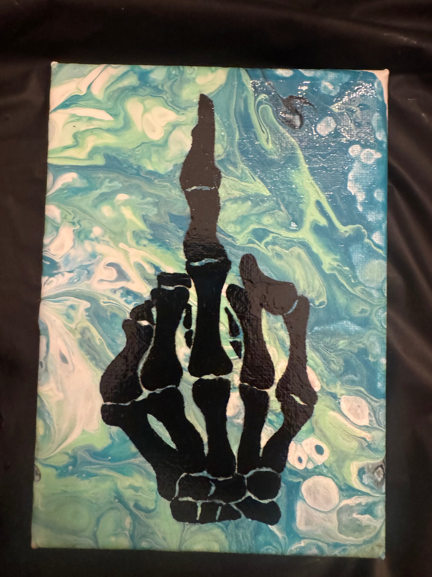 Blue Fluid Pour Skeleton Hand